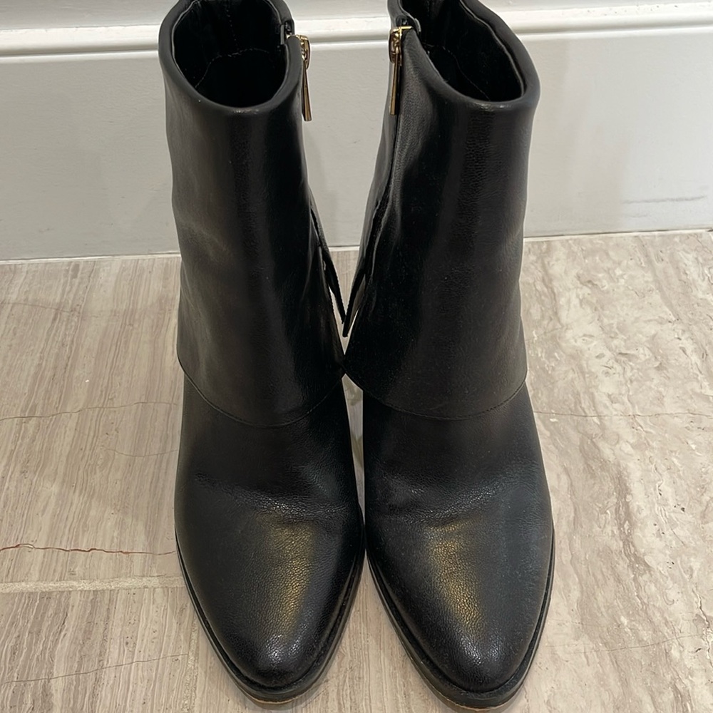 Black Jessica Simpson ankle boots.